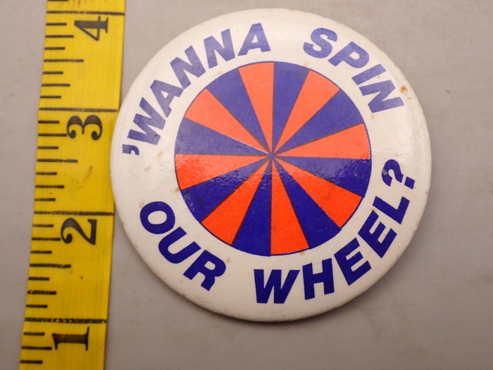 Vintage Wanna Spin Our Wheel Pinback Button F7A7