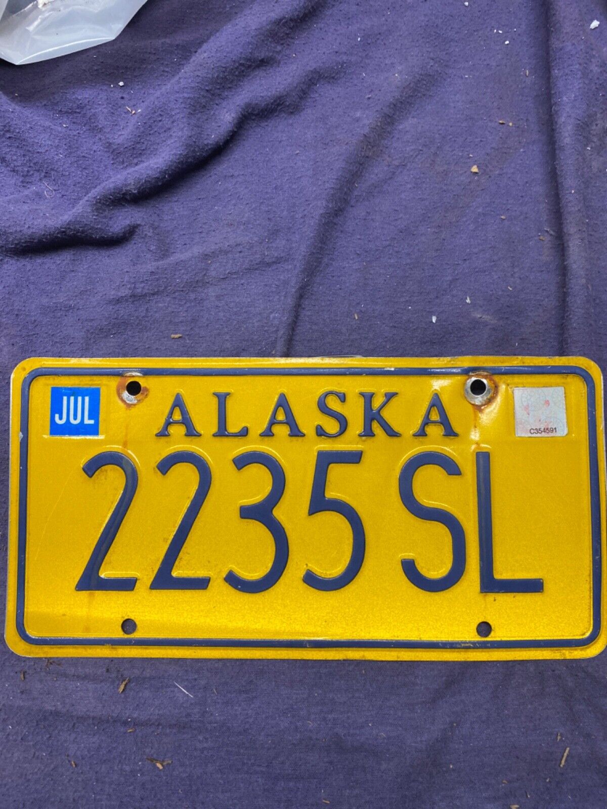 Expired 1990’s Alaska Yellow  License Plate