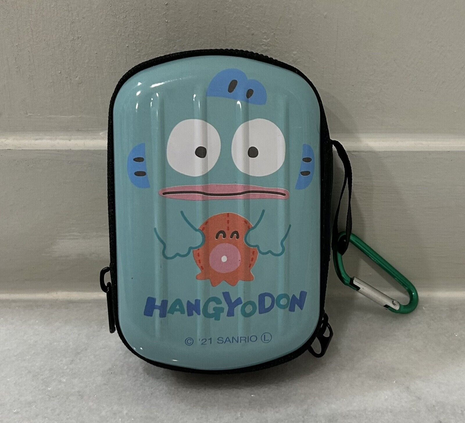 Sanrio Hangyodon zippered hardshell case with hook