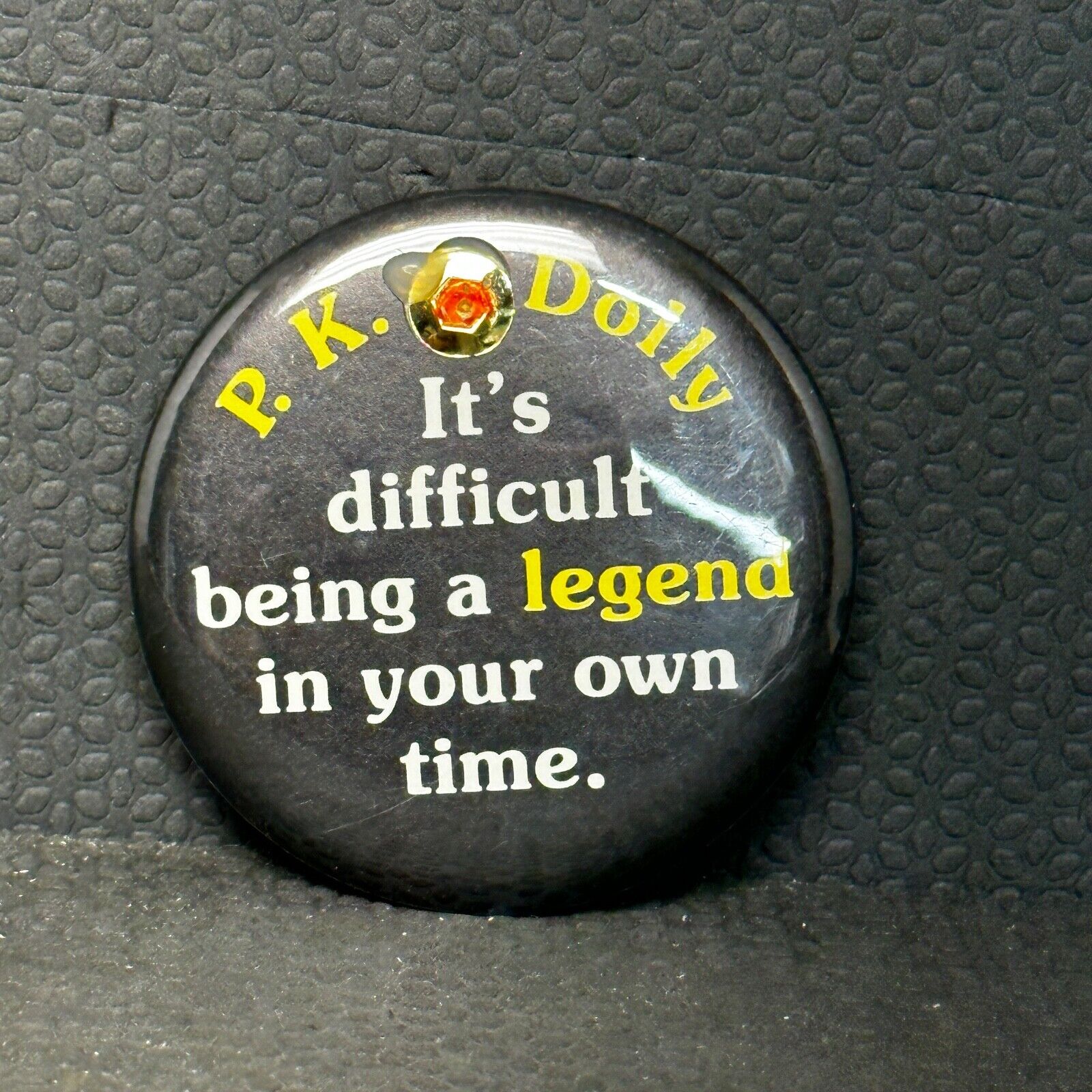 Vintage P. K. Dolly It's difficult being a legend in your own time pin button