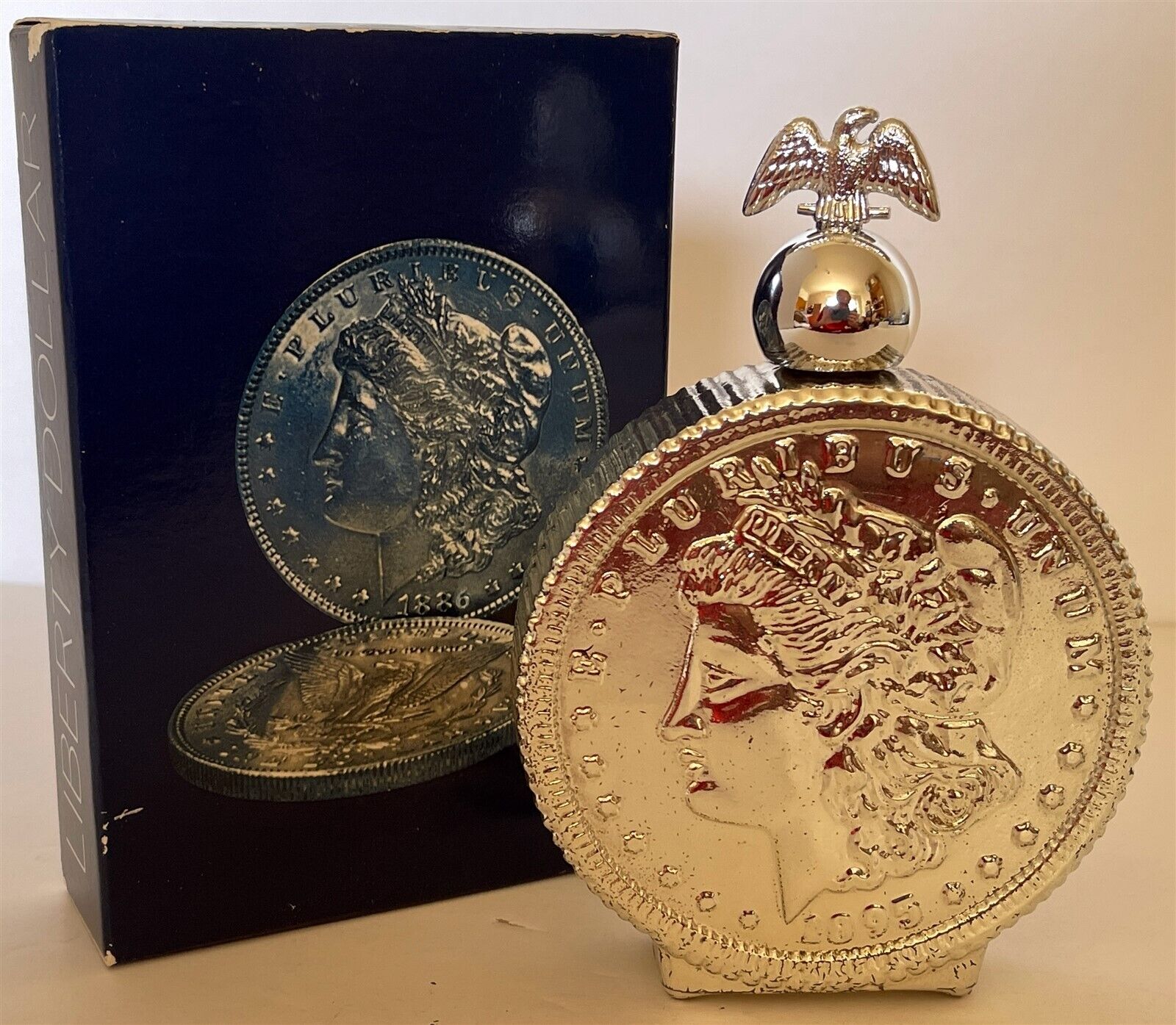 Avon LIBERTY DOLLAR Morgan coin figurine bottle & box - ÖLAND Scent -full- 1970s