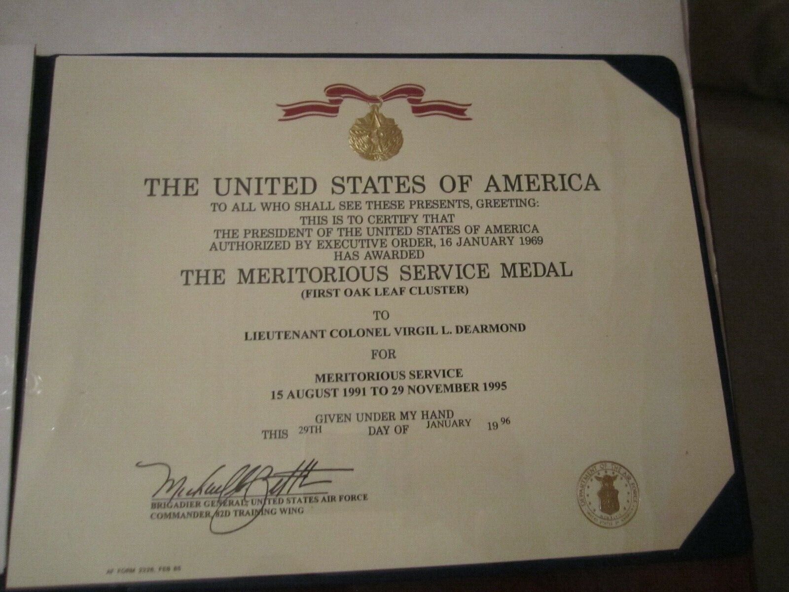 1996 U.S. MERIT SERVICE MEDAL CERTIFICATE 1ST OAK LEAF - LT COL DEARMOND PORTFOL