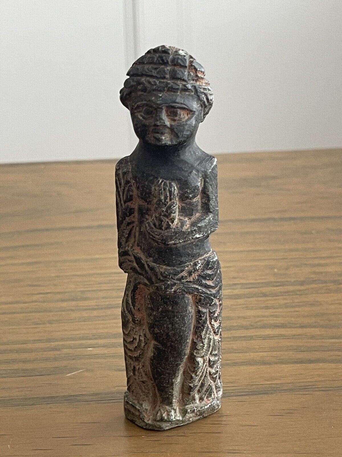 CIRCA NEAR EASTERN BLACK STONE CARVED STAND STATUE.
