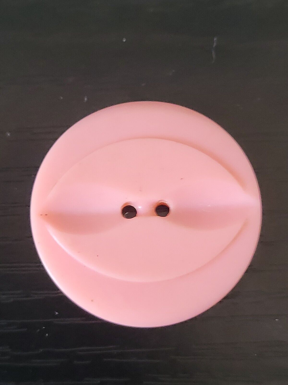 Vintage Colt manufacturing pink # 77 button 1 1/8\