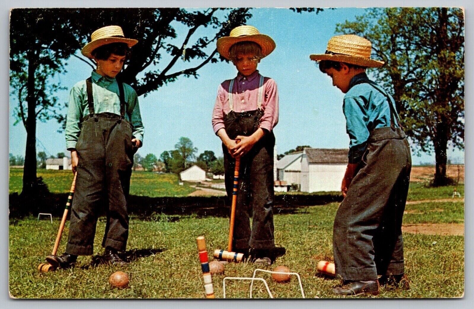 Greetings Pennsylvania Dutch Country Amish Boys Croquet Vintage UNP Postcard