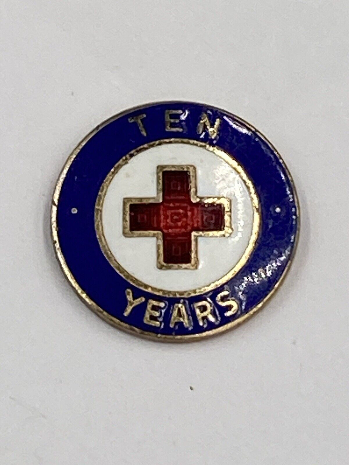 Vintage Red Cross 10 Years Round Shaped Lapel Pin