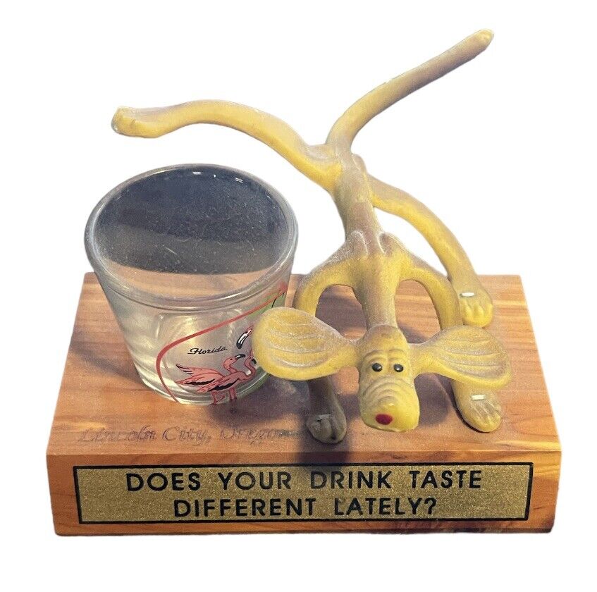 DOES YOUR DRINK TASTE DIFFERENT LATELY? Vtg Souvenir Shot Glass Funny Dog Peeing