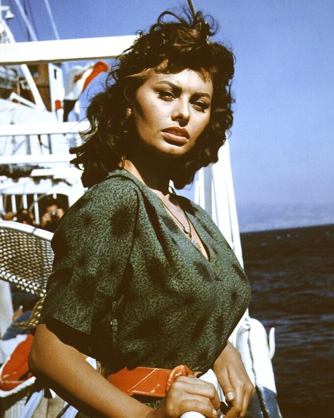 Sophia Loren beautiful 1950's pose in green dress on ship 24x36 inch Poster