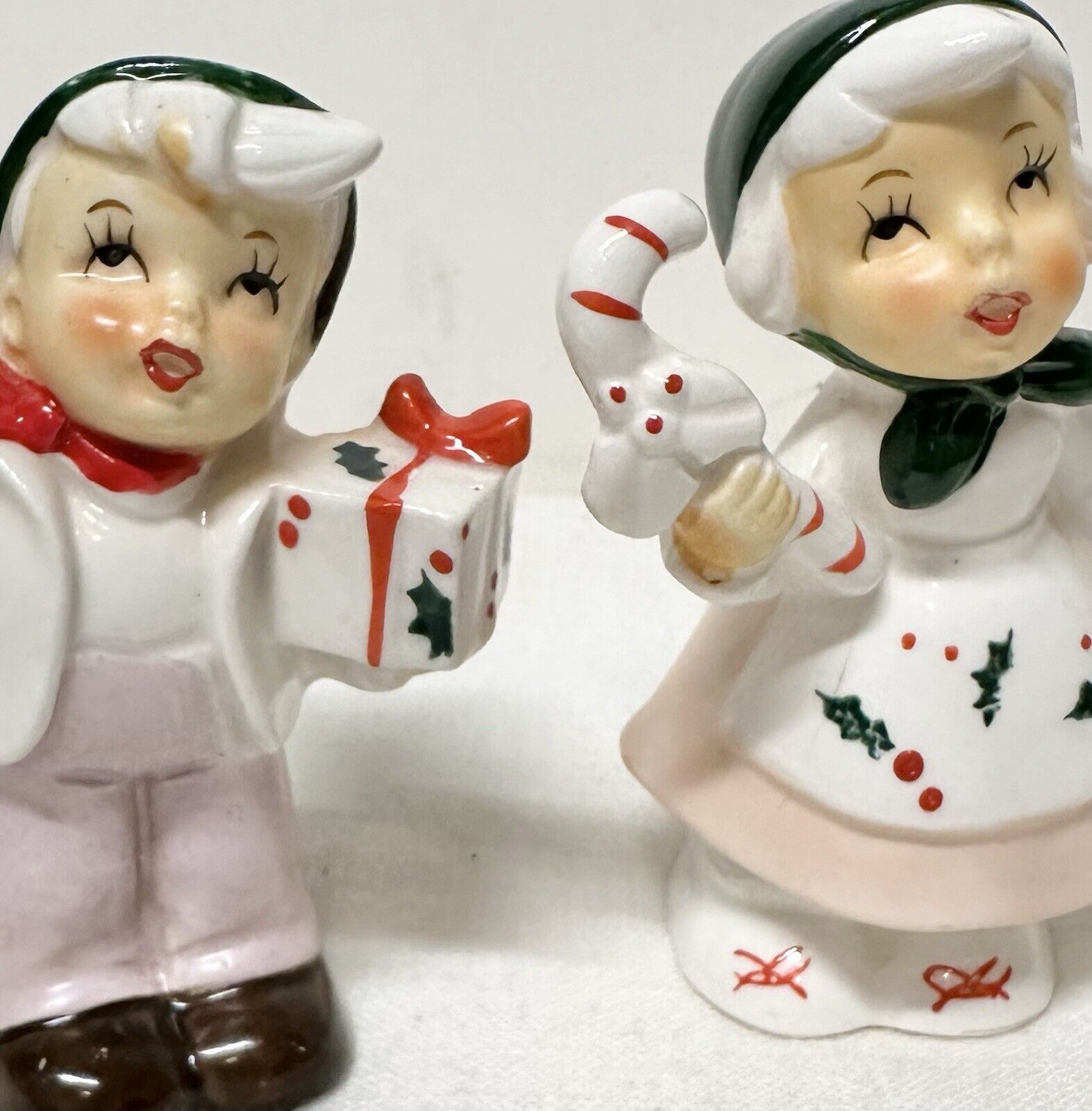 Vintage Christmas Dutch Boy And Girl Holding Candy cane And Gift.