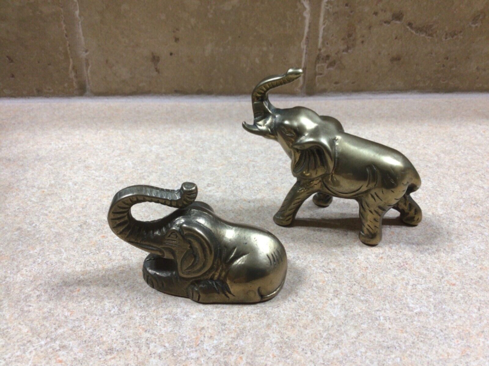 two brass elephant