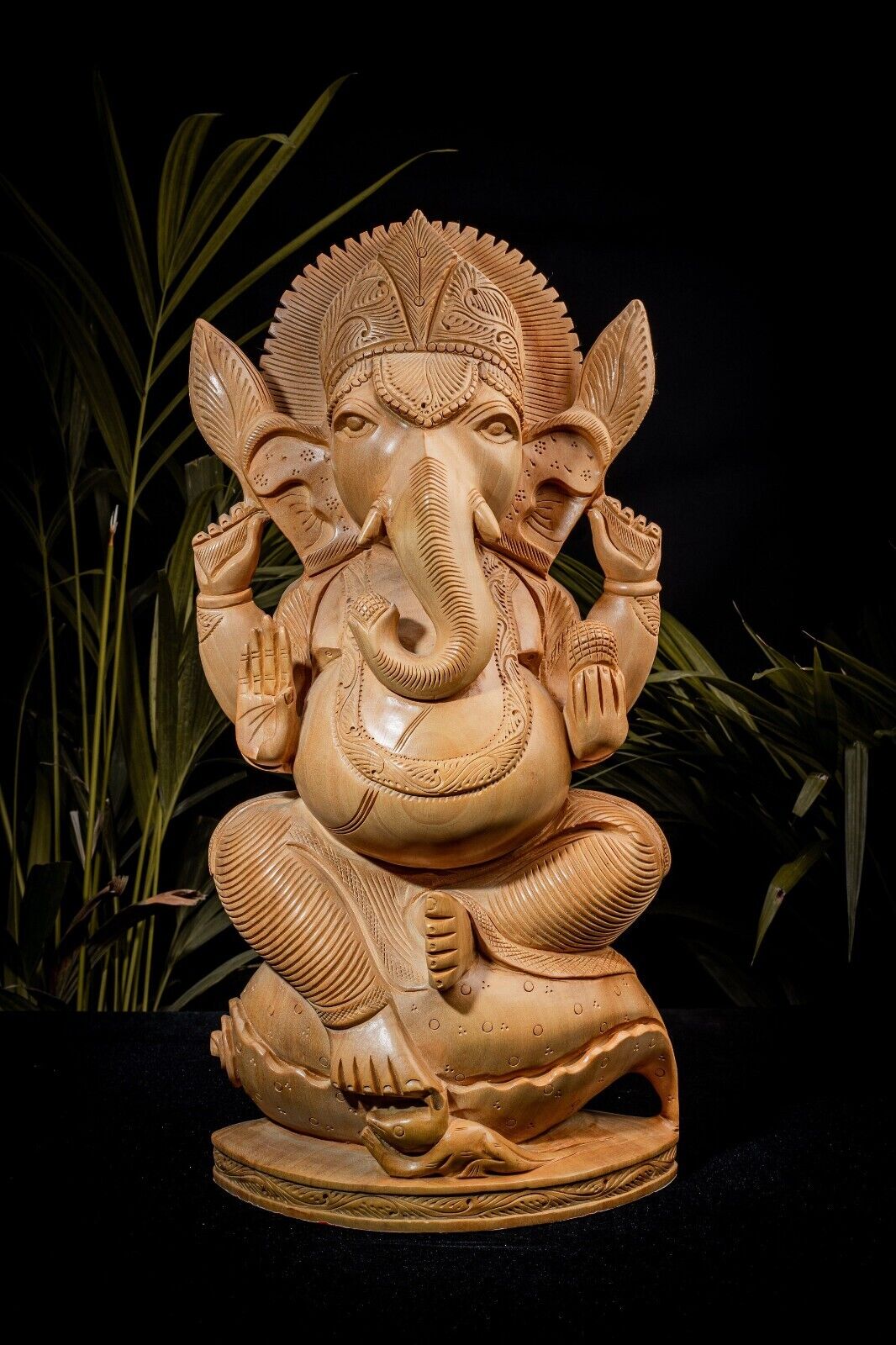 Handcrafted Wooden Four-Hand Ganesha Sitting Statue Sustainable Living