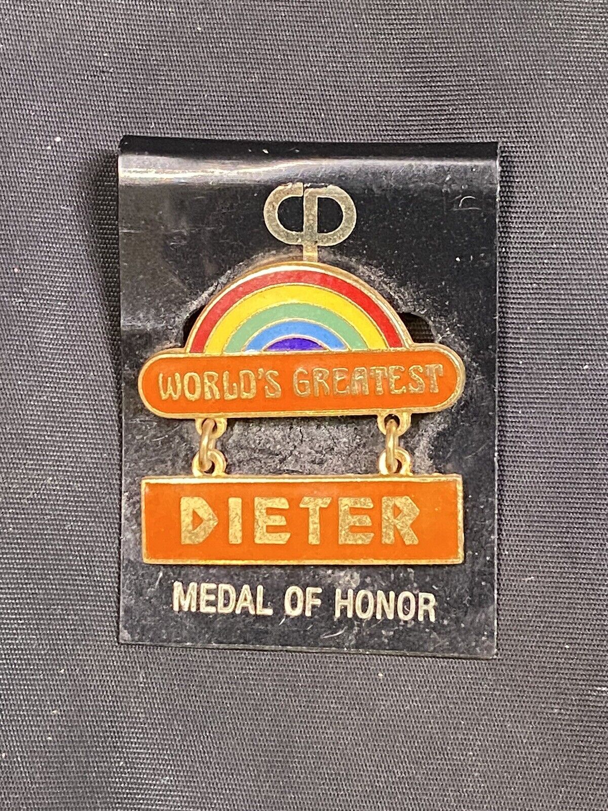 VINTAGE WORLDS GREATEST DIETER RAINBOW PIN MEDAL OF HONOR ON CARD NOS