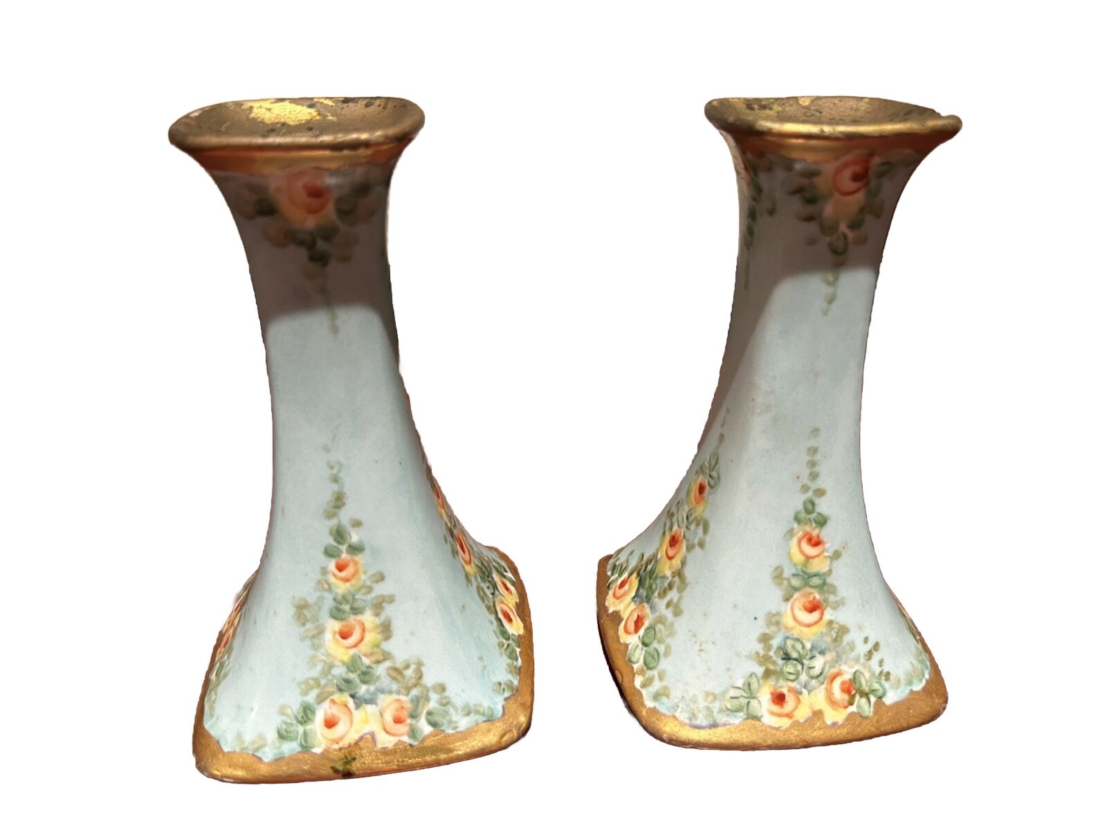 A Pair Of Vintage Porcelain Floral Candle Holders