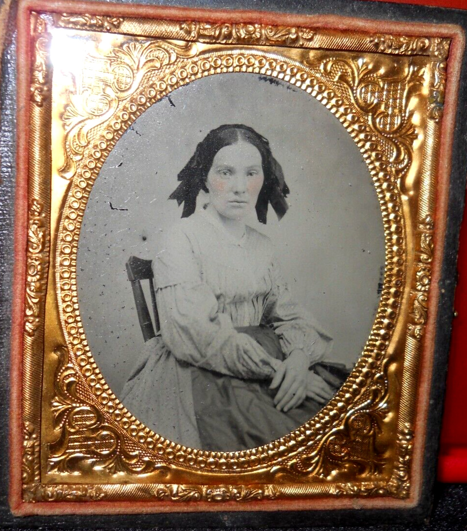 1/6th Size Ruby Ambrotype of young lady in half case