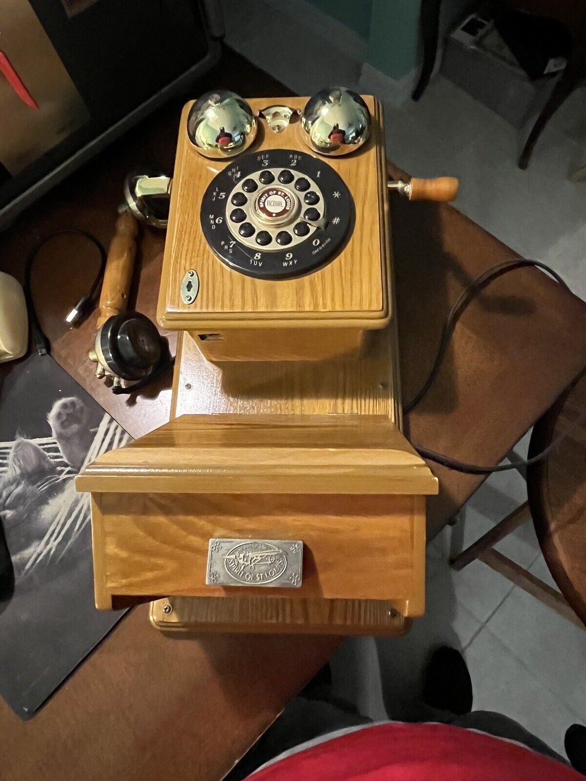 Vintage oak wall telephone. Brass accents. 1970's. Spirit of St. Louis. Pushdial