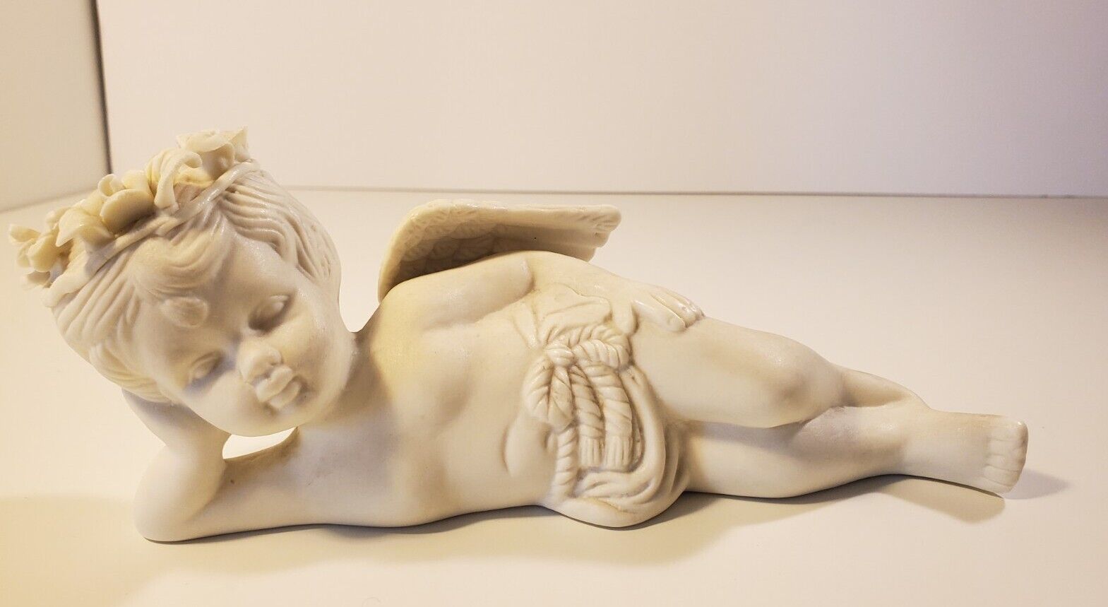 Ceramic Winged Cherub Angel Figurine Laying Down Porcelain 8\