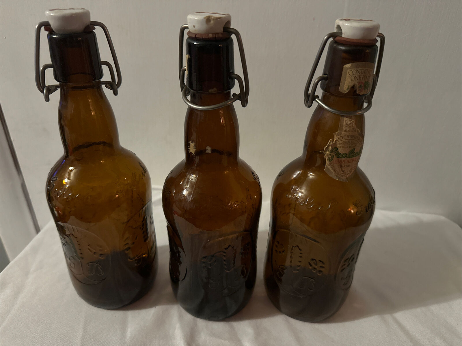 3 Vintage Grolsch Georga Brown Glass Beer Bottles with Porcelain swing top.