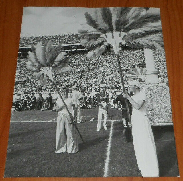 1960 Press Photo Miami Orange Bowl Halftime Show Guys Hold Exotic Palm Tree Fans
