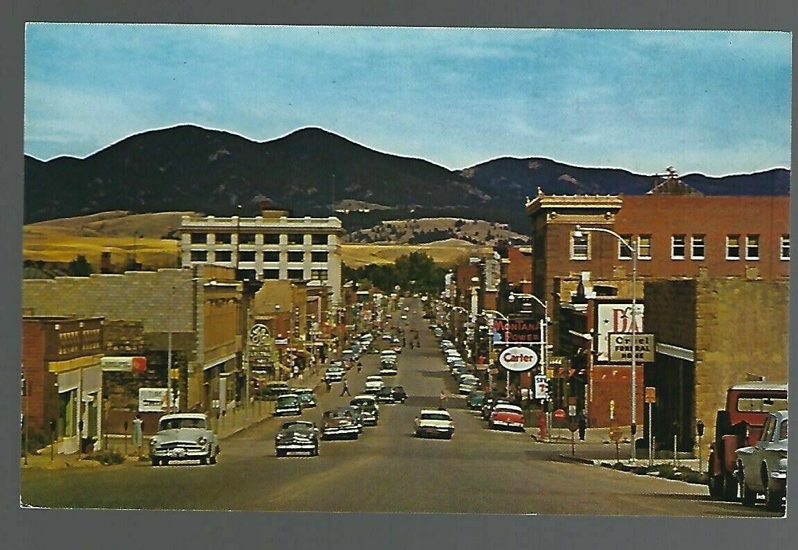 Main Street Lewistown Montana 40\'s & 50\'s cars Carter sign Vintage Postcard AO3