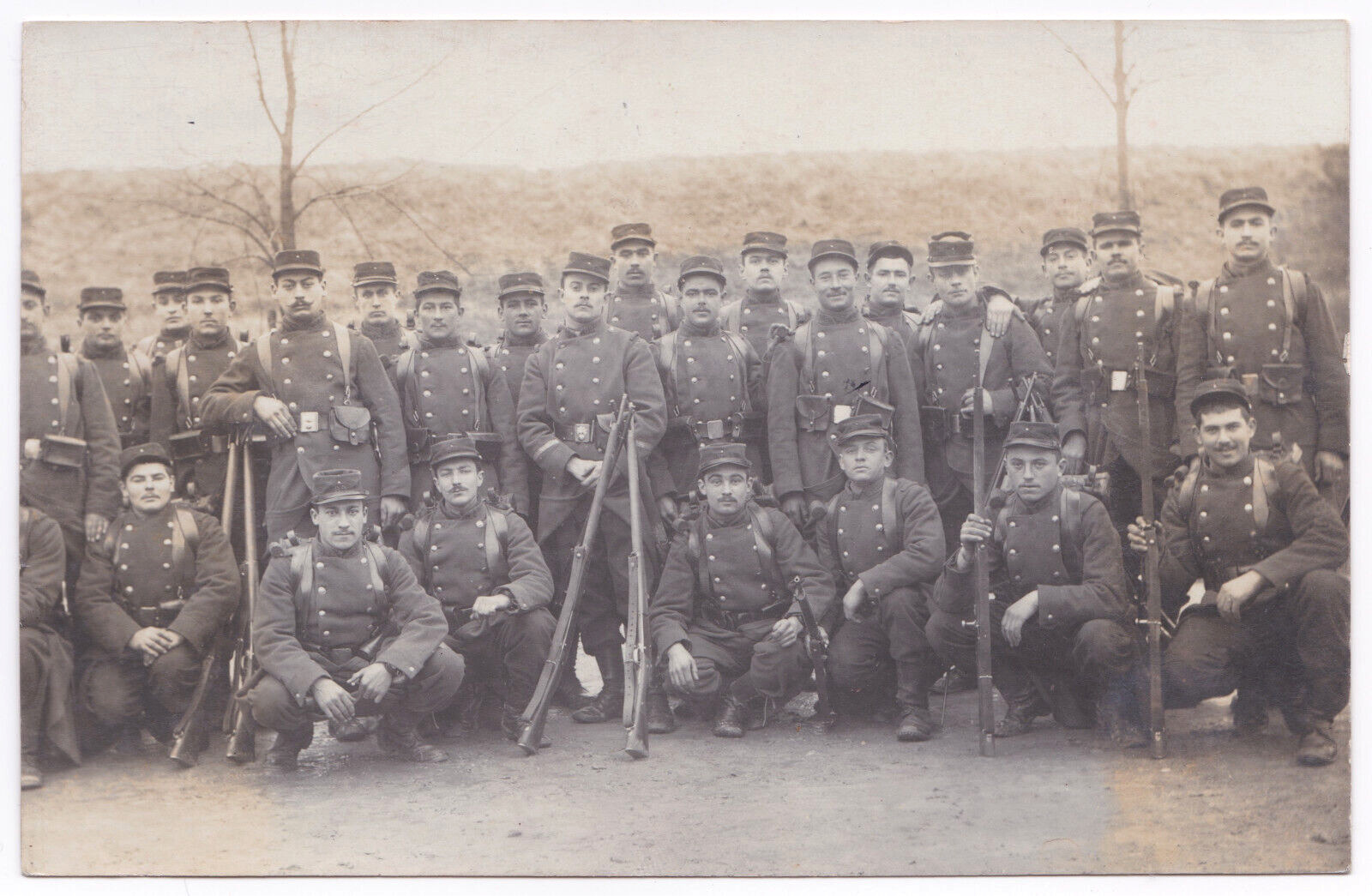 WW1 WWI Era French Soldiers Group Portrait Outside Leaning Rifles RPPC Postcard