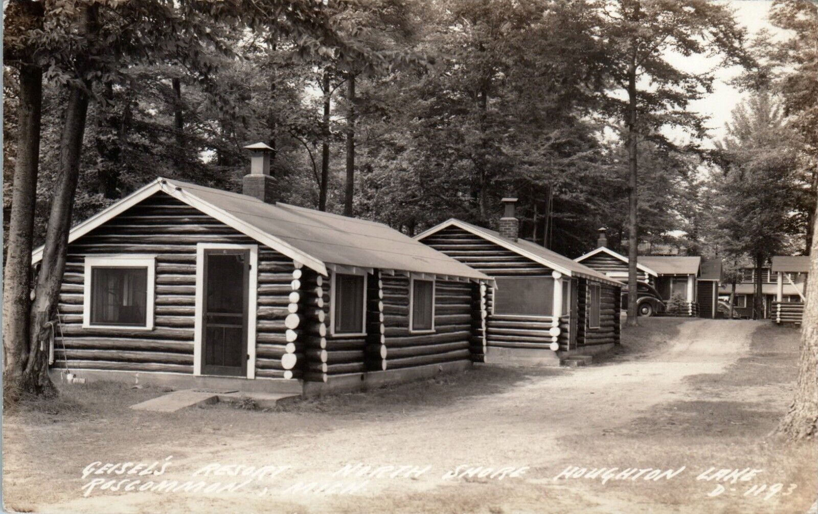 Vintage RPPC Postcard Roscommon MI Houghton Lake Resort Log Cabins