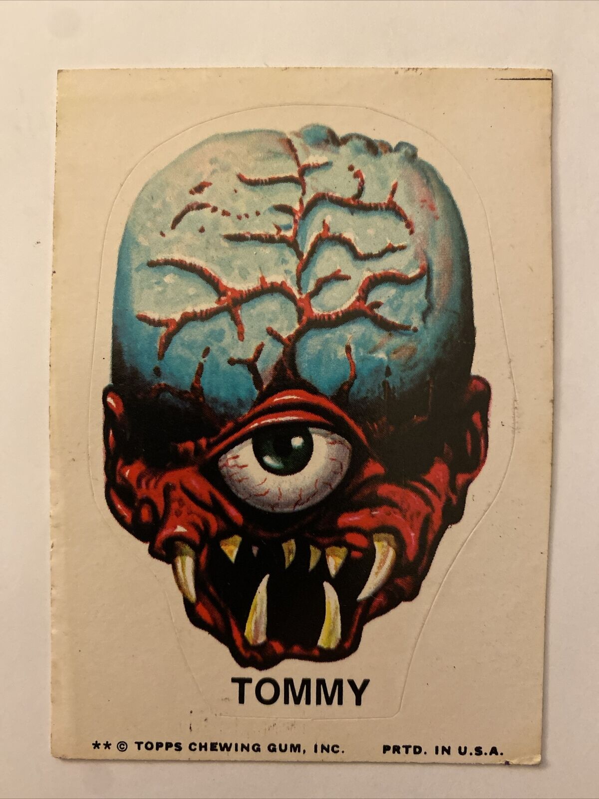 Vintage 1976 Topps Ugly Monster Sticker Trading Card TOMMY