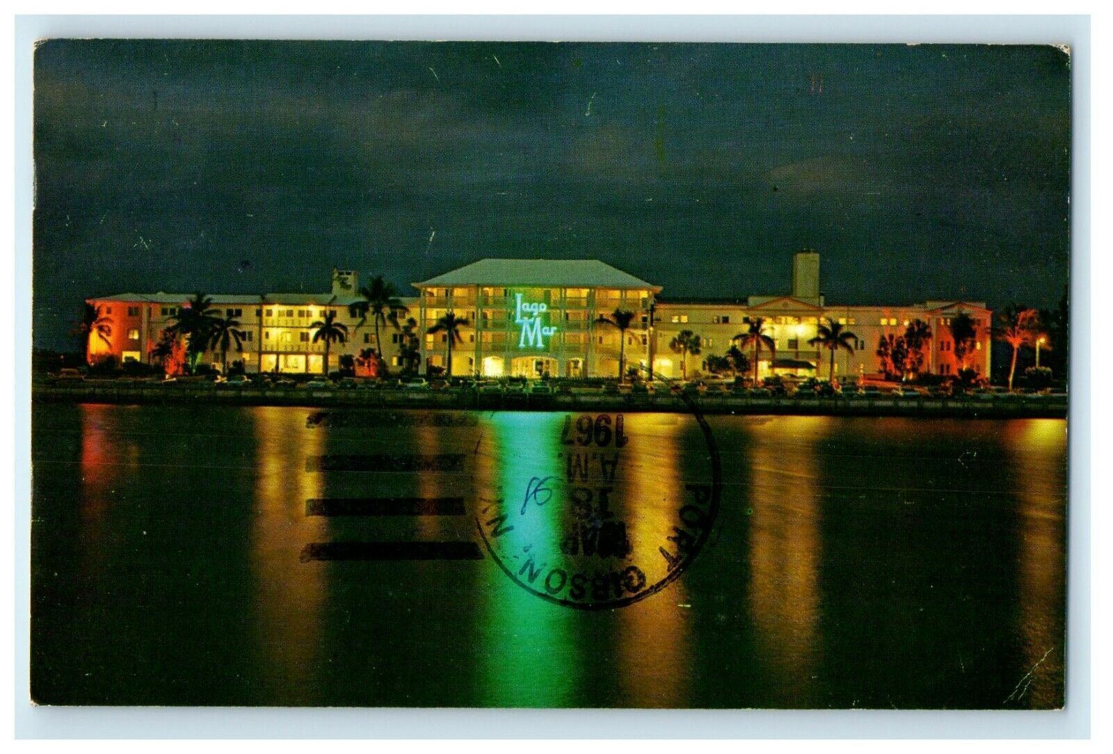 1967 Lago Mar Hotel & Apartments Night View Fort Lauderdale Florida FL Postcard