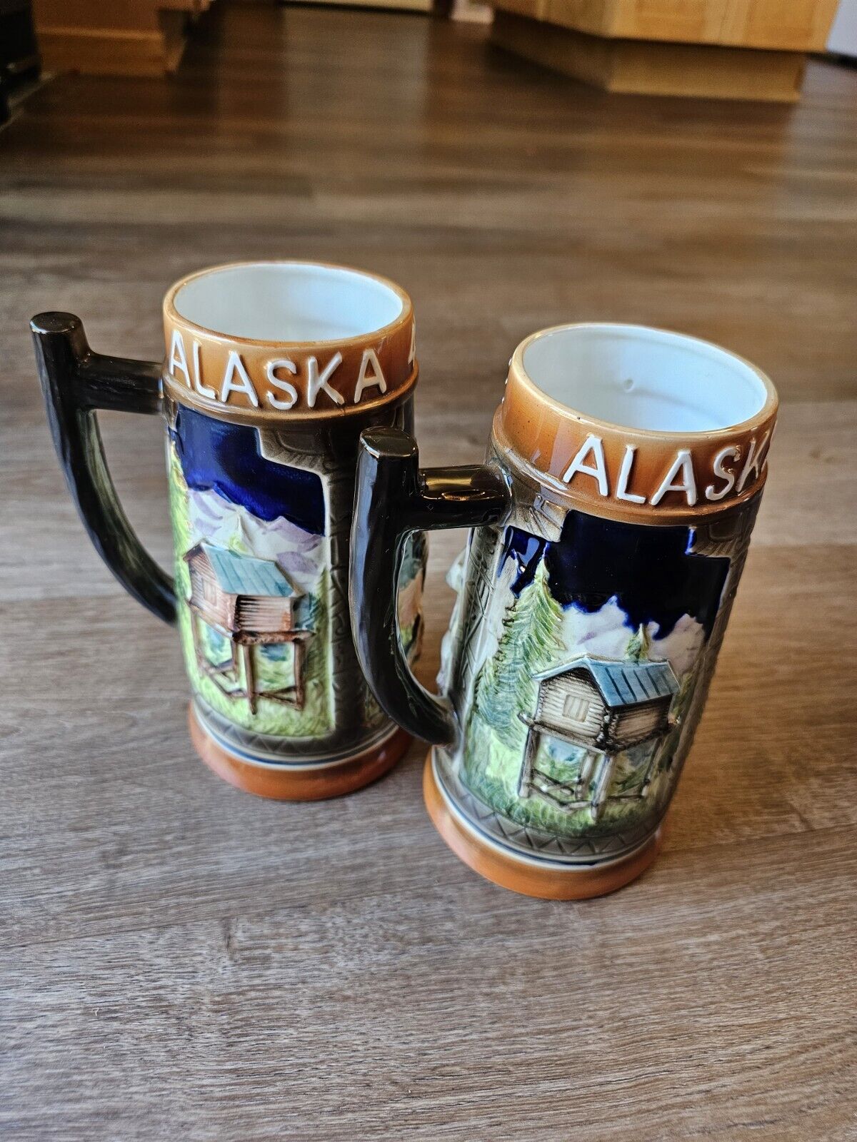 Set of 2 vintage ceramic Alaskan beer steins, says \
