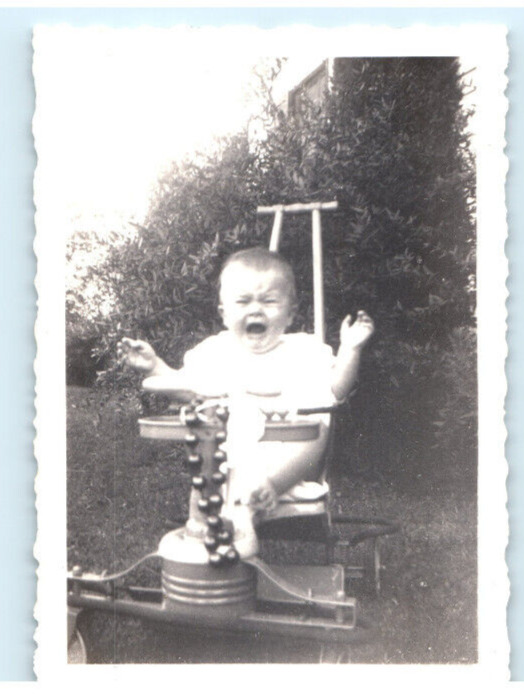 Vintage Photo 1940s, Baby Screaming/Crying on Antique Bouncer, Lawn , 3.5 x 2.5