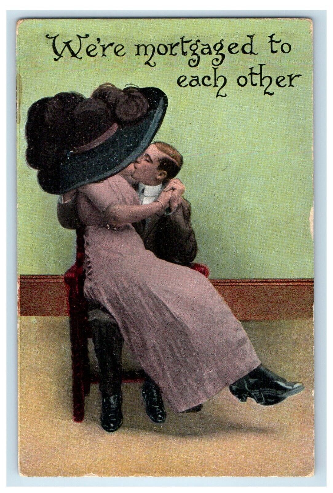 c1910\'s A Sweet Couple Kissing Widow Hat We\'re Mortgaged To Each Other Postcard