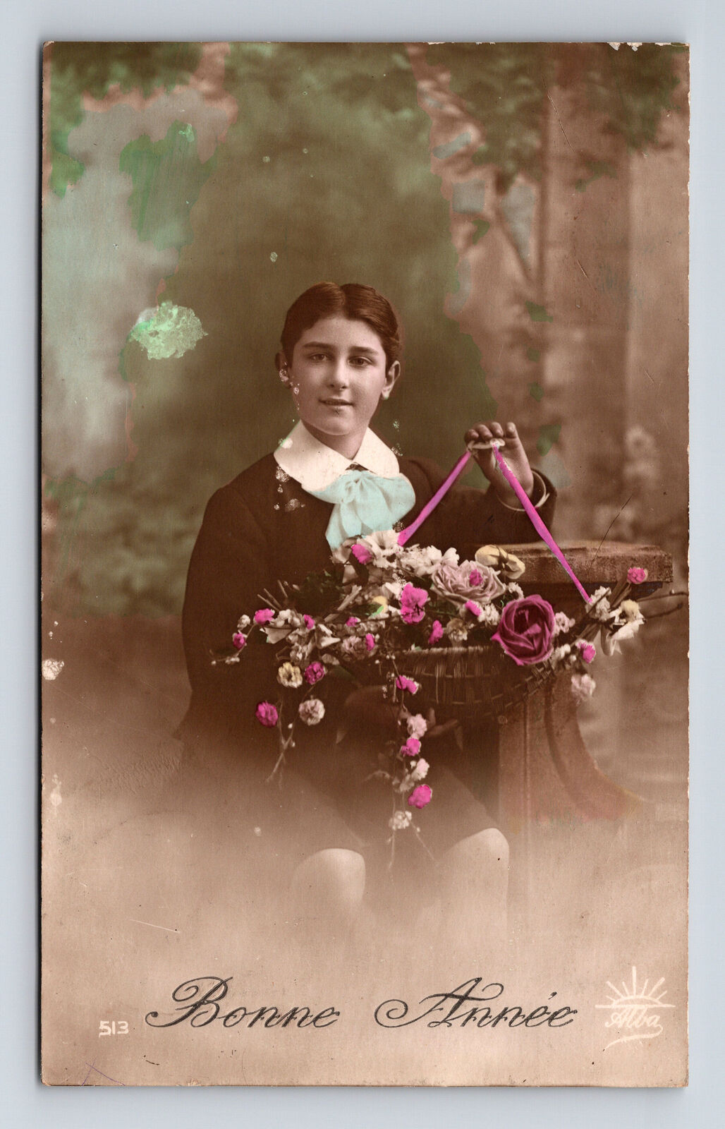 c1913 RPPC Portrait of Young Boy With Flowers French Hand Colored Postcard