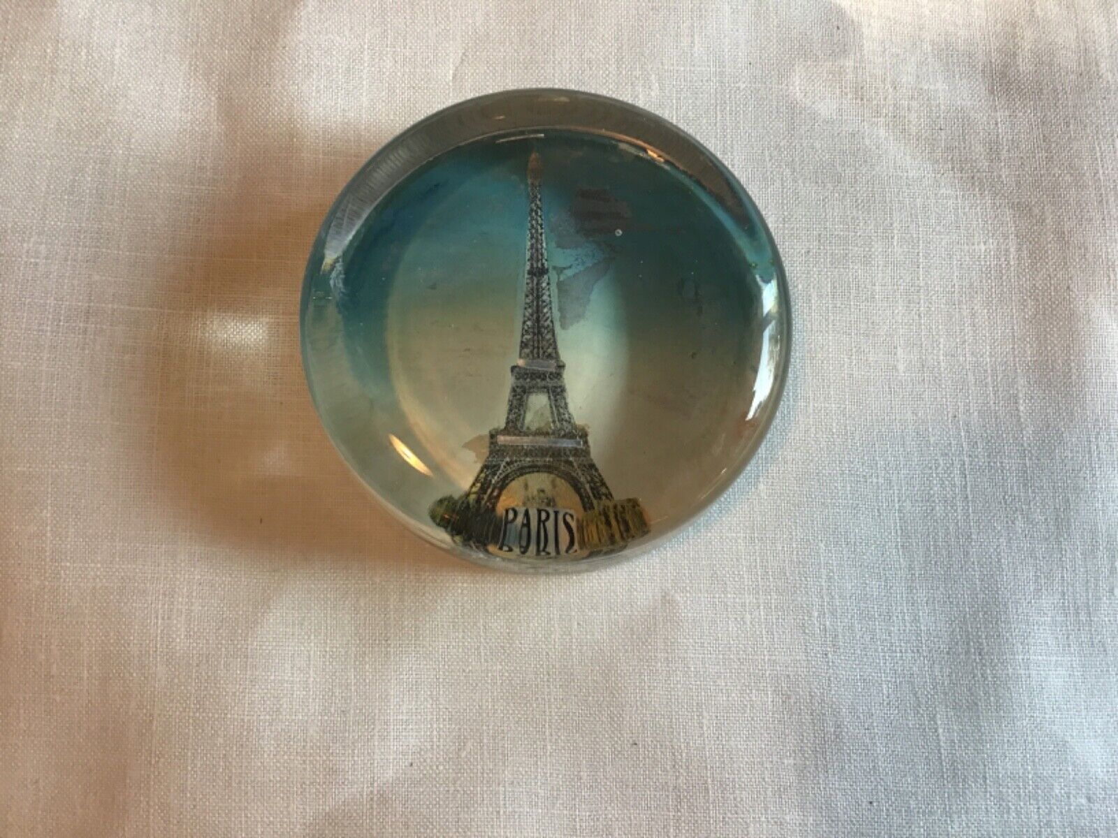 antique Eiffel Tower glass paper weight 2 1/2\
