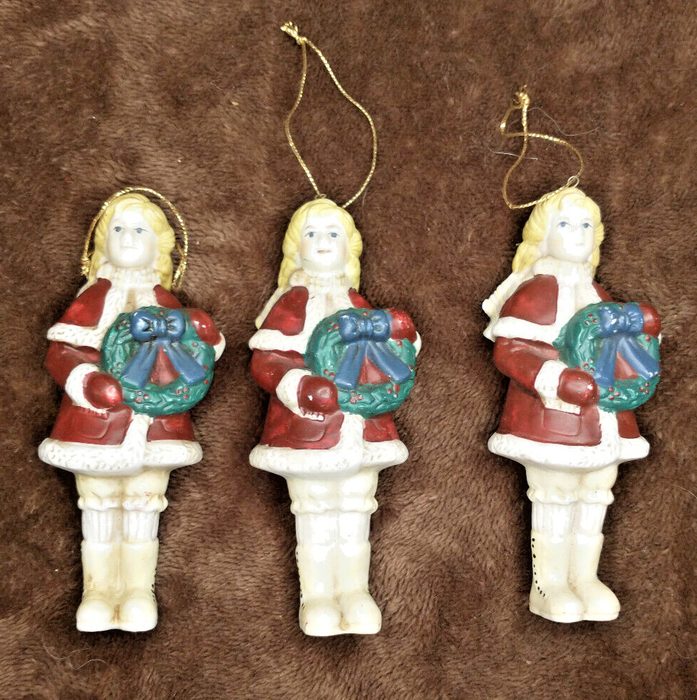 Vintage Ceramic Christmas Ornaments 3 Girls Red Coat holding a Green Wreath