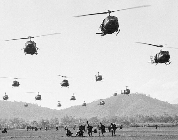 U.S. Soldiers with UH-1 Huey Helicopters 8\