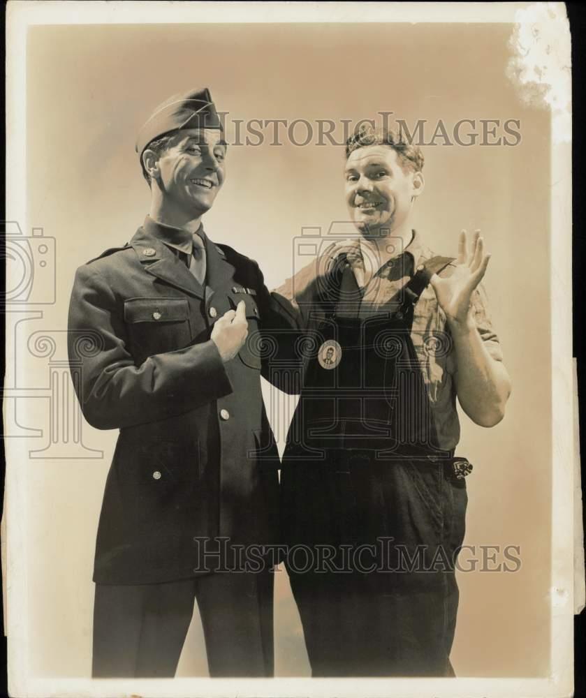 1942 Press Photo U.S. soldier with farmer wearing \