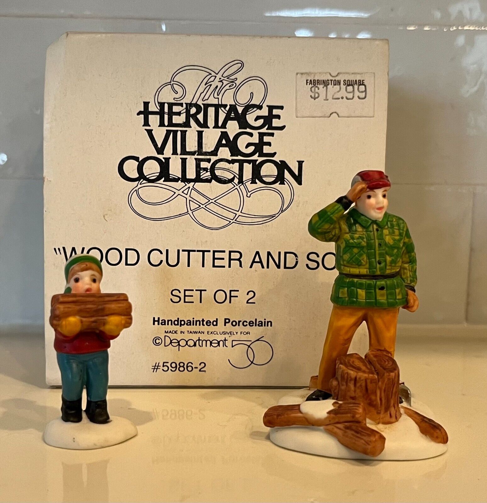 Dept 56 Heritage Village Woodcutter and Son #56.59862