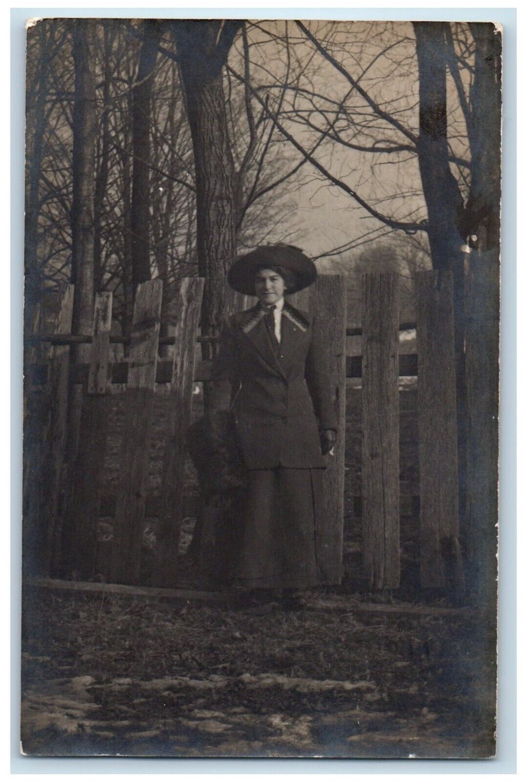 1913 Woman Dress Hat Hand Warmer Fence Ithaca New York NY RPPC Photo Postcard