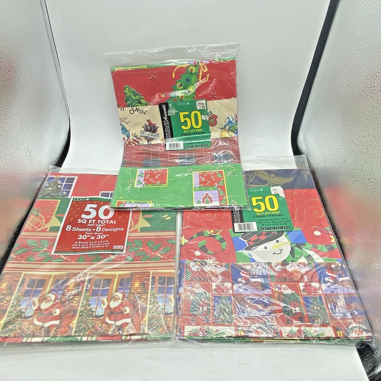 Vtg Sealed 150 sq ft CLEO Christmas Sheet Wrapping Paper 24 Sheets 8 Designs 