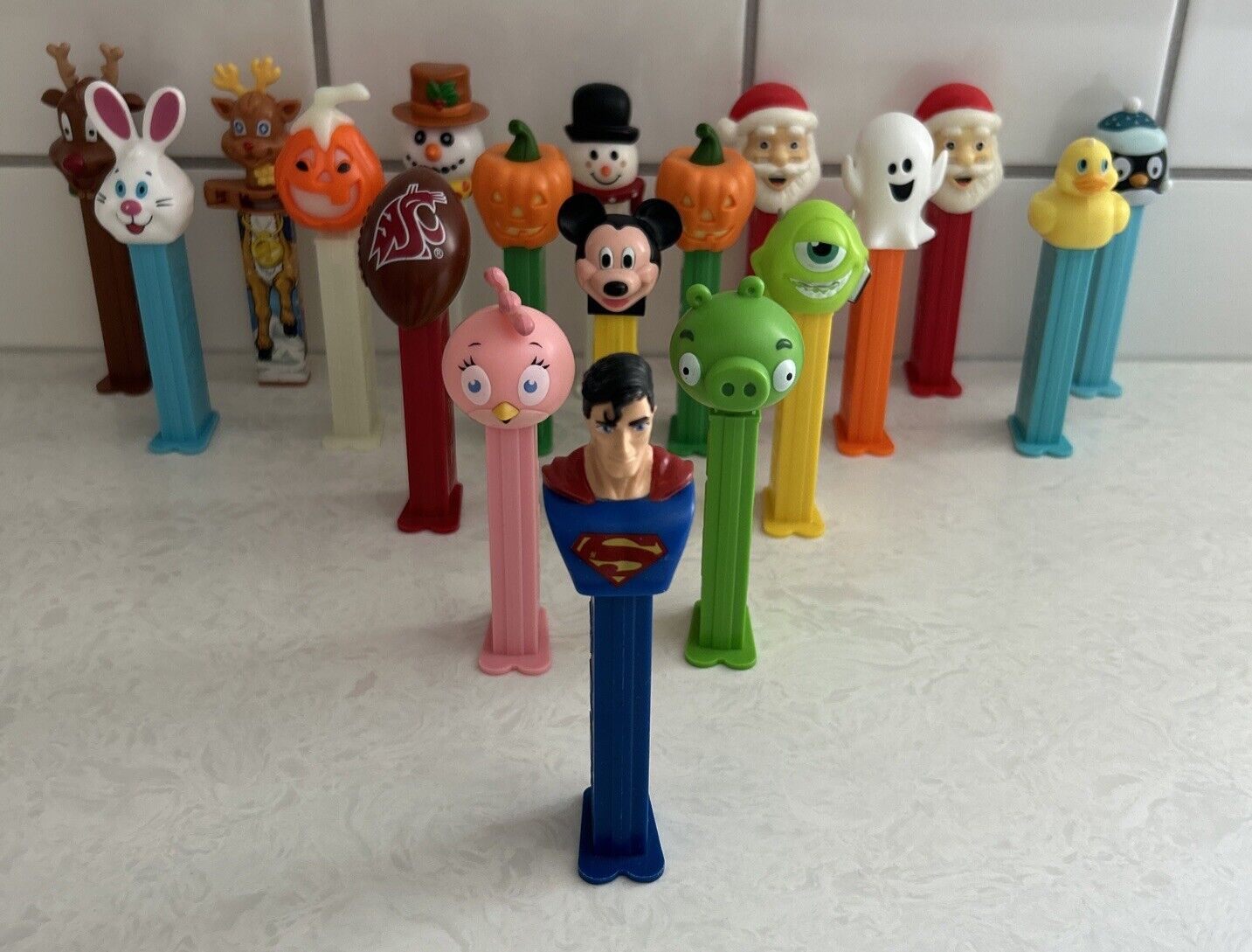 Pez Dispensers Mixed Lot of 19- Disney, Angry Birds, Superman, WSU, and Holiday