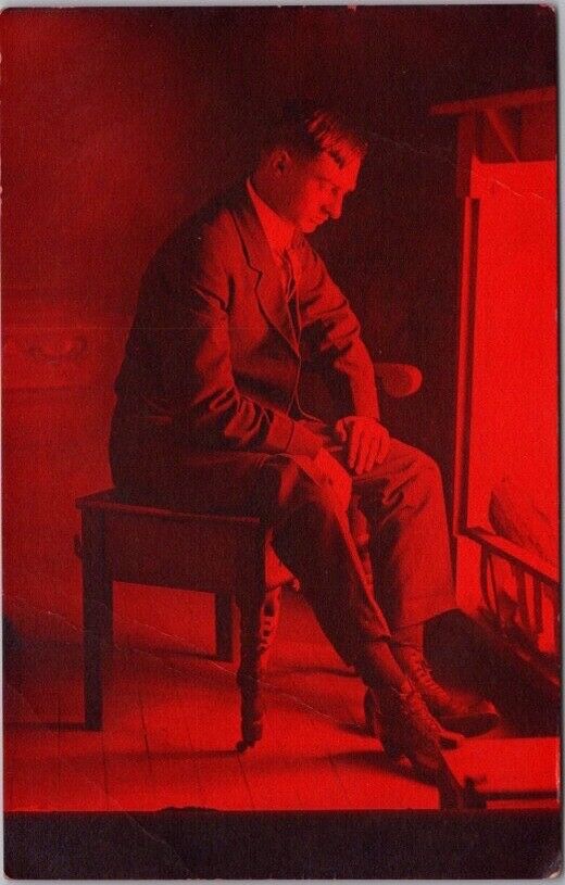 c1910s Romance Greetings Postcard Forlorn Man at Fireplace / RED Card - UNUSED