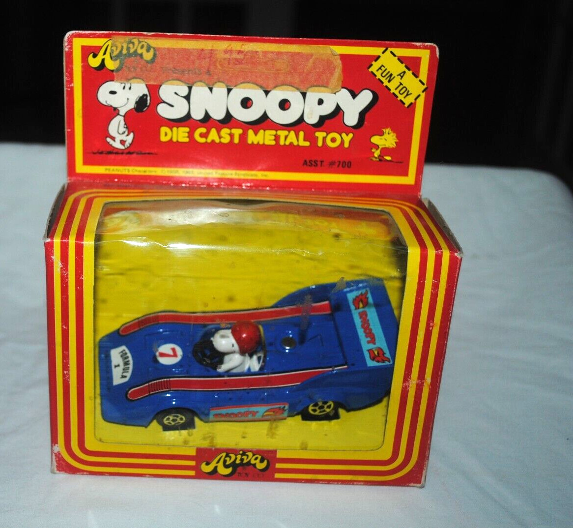 Snoopy die-cast metal toy, blue race car, Aviva, 1975, NM in box