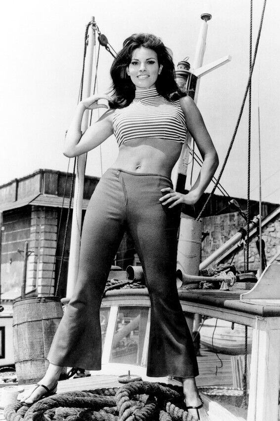 RAQUEL WELCH IN TANK TOP POSING ON DECK ON FOAT 24x36 inch Poster