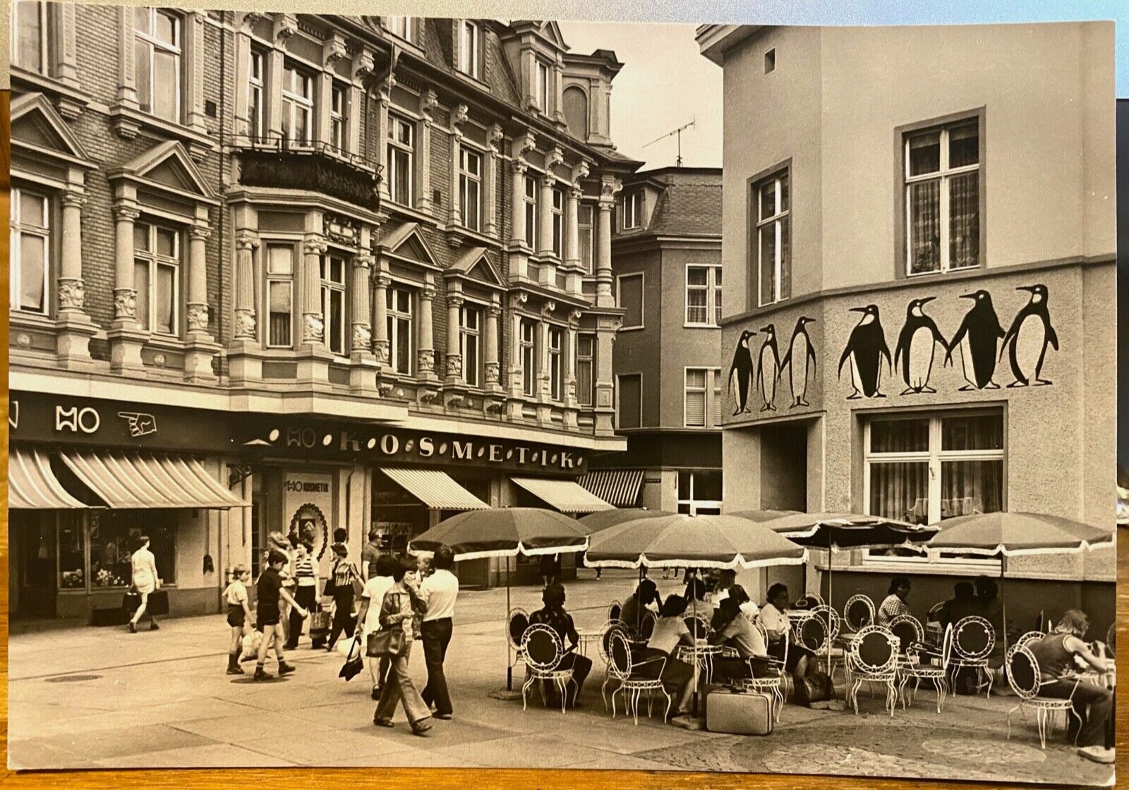 German RPPC Postcard KÖTHEN Penguin PINGUIN Sidewalk Cafe 1977 Real Photo Melzer