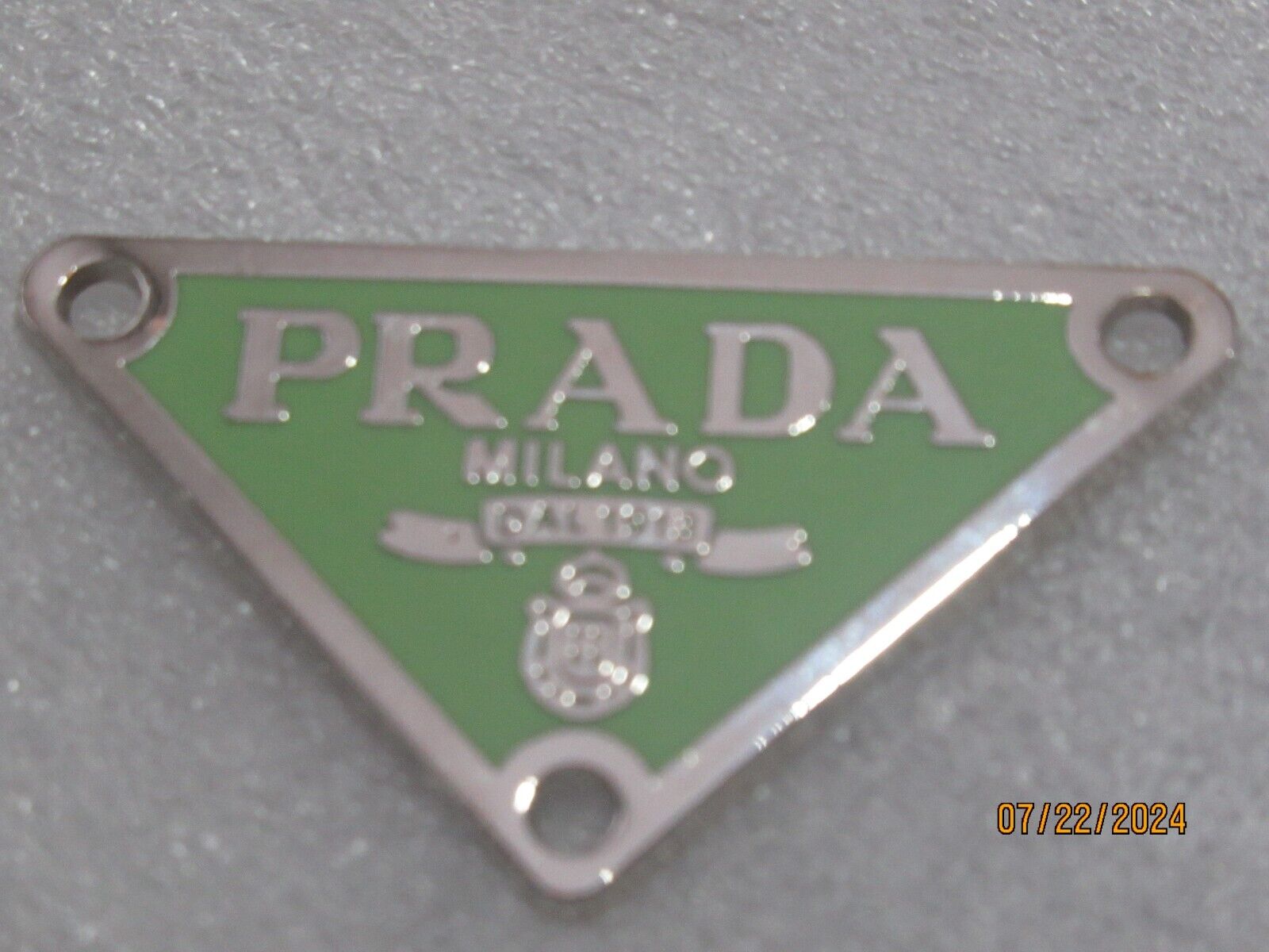 PRADA ZIP PULL   1\'\'x1.5\'\'  silver  tone GREEN ,   THIS IS FOR 1