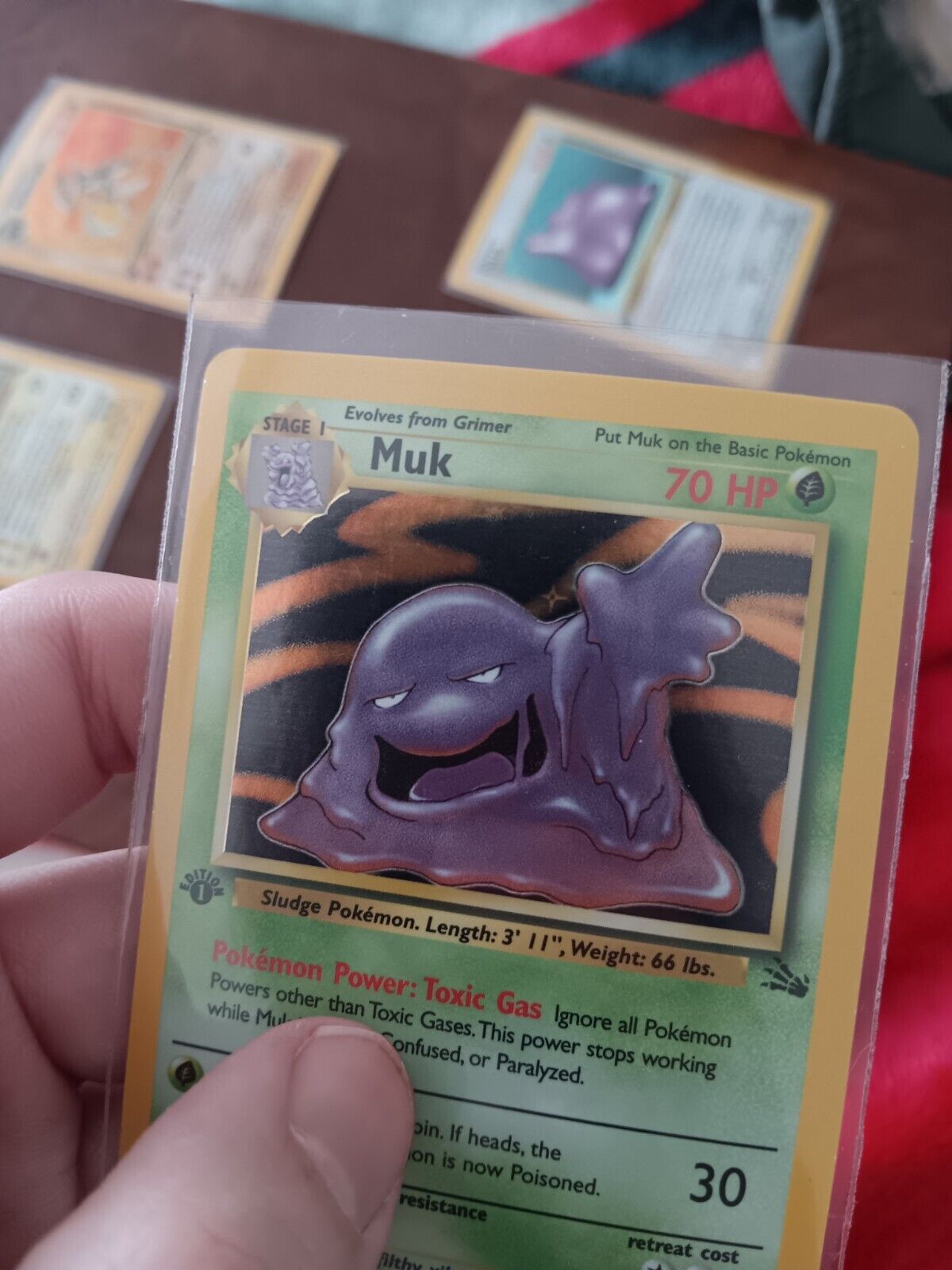 1999 Pokémon Fossil 1st Edition #13 Muk - Holo Near Mint Condition