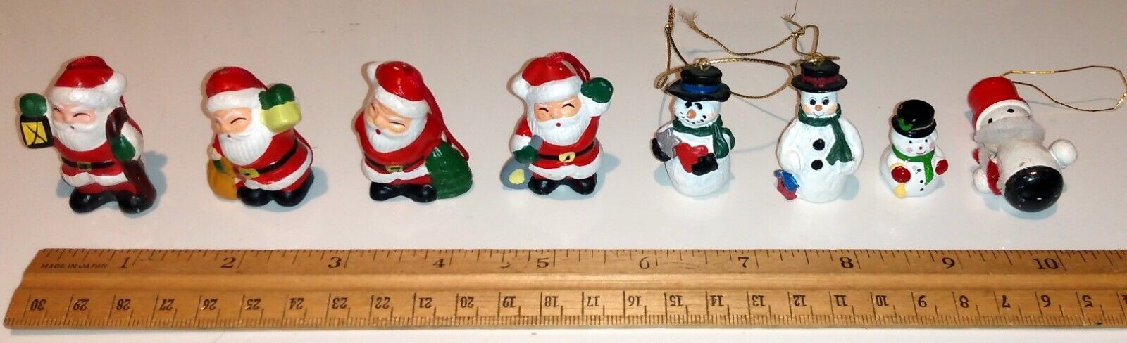 EIGHT SMALL SANTA AND SNOWMAN ORNAMENTS OR FIGURINES, RESIN/WOOD, PRE-OWNED
