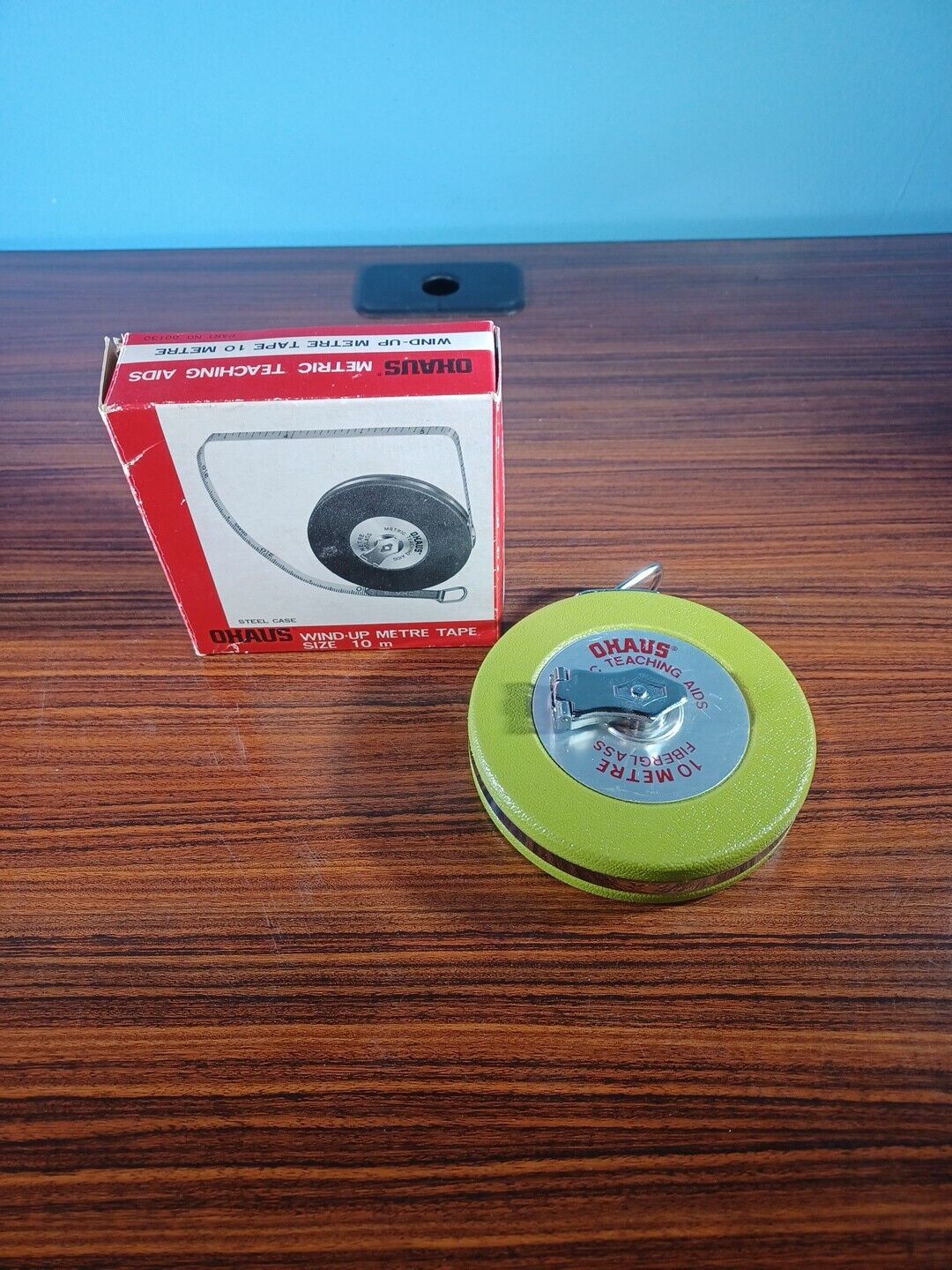 Vintage Ohaus Metric Teaching Aid  Green Wind-Up 10 Metre Tape W/Box Steel Case
