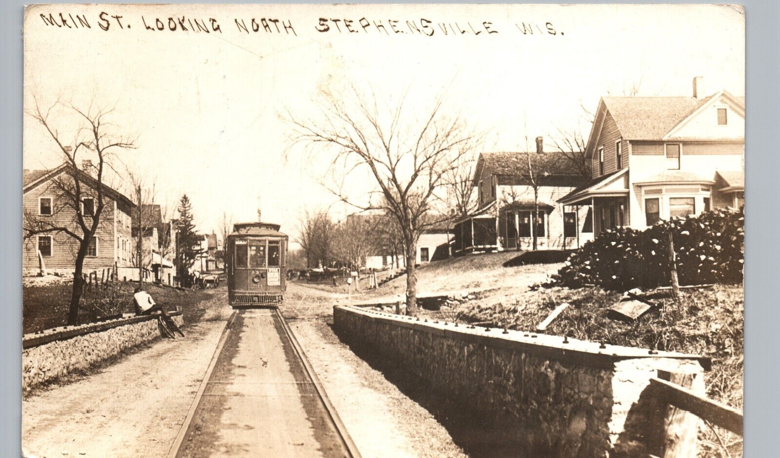 TRICK TROLLEY ON STREET stephensville wi real photo postcard rppc main houses