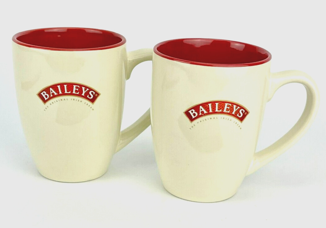 Set of 2 Baileys Irish Cream Ceramic Coffee Mugs Signed R. A. Bailey Ivory & Red
