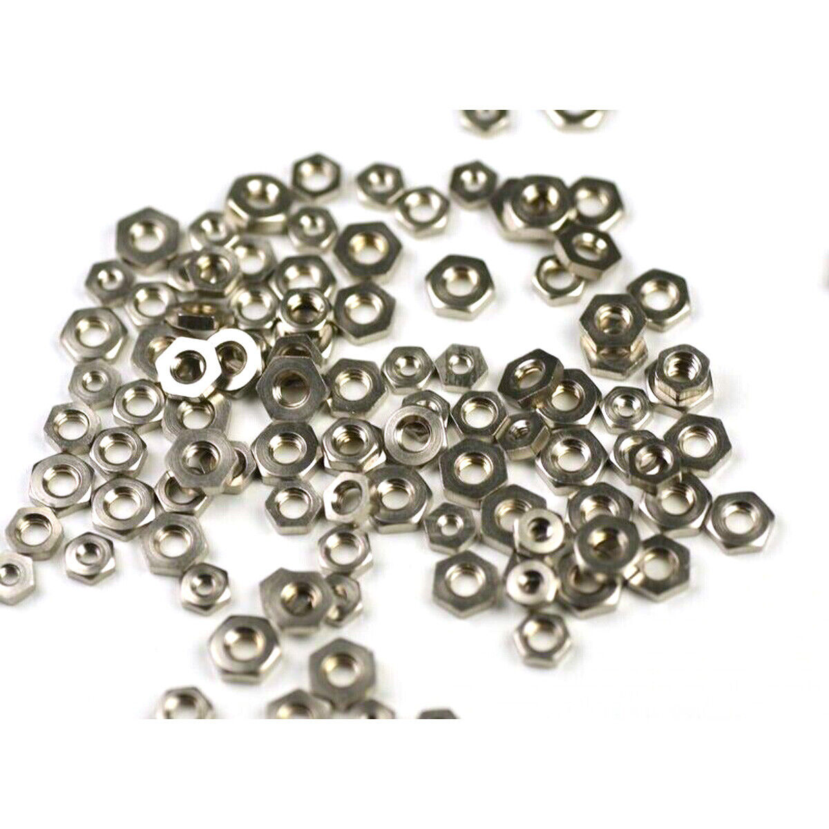 100x Nickelled CLOCK NUTS ASSORTED clockmakers spares repairs 3-7mm movement
